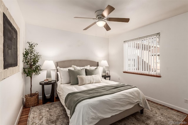 2028 Perry St, Denver, CO 80212 - bedroom featuring wood finished floors, baseboards, and ceiling fan