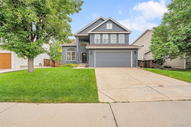 8838 S Dudley St, Littleton, CO 80128 - traditional home featuring stucco siding, an attached garage, and concrete driveway