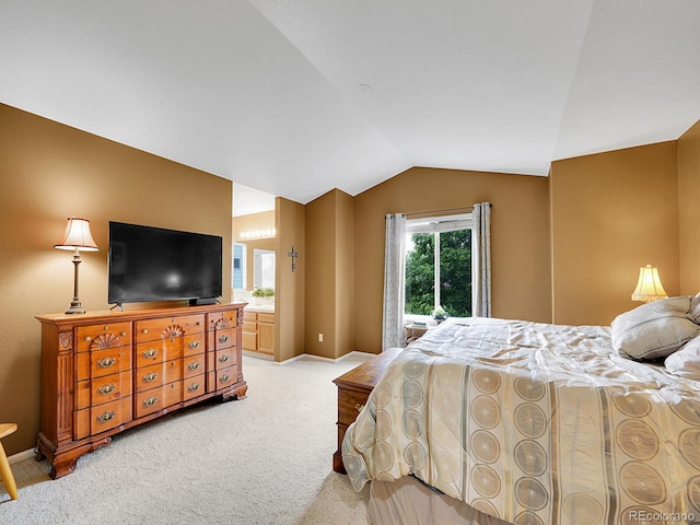 8838 S Dudley St, Littleton, CO 80128 - bedroom with vaulted ceiling, light colored carpet, and baseboards