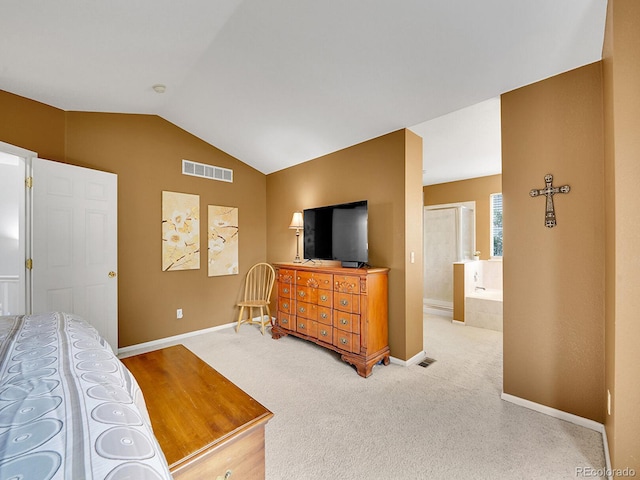 8838 S Dudley St, Littleton, CO 80128 - carpeted bedroom with lofted ceiling, baseboards, and ensuite bathroom