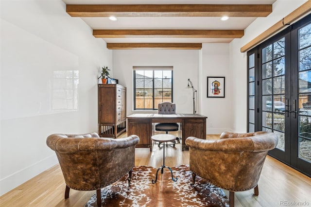office space featuring french doors, light wood-type flooring, baseboards, beam ceiling, and recessed lighting