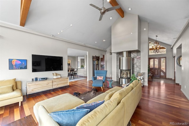 12653 Rancho Ct, Conifer, CO 80433 - living area featuring beamed ceiling, high vaulted ceiling, wood finished floors, ceiling fan, and a chandelier