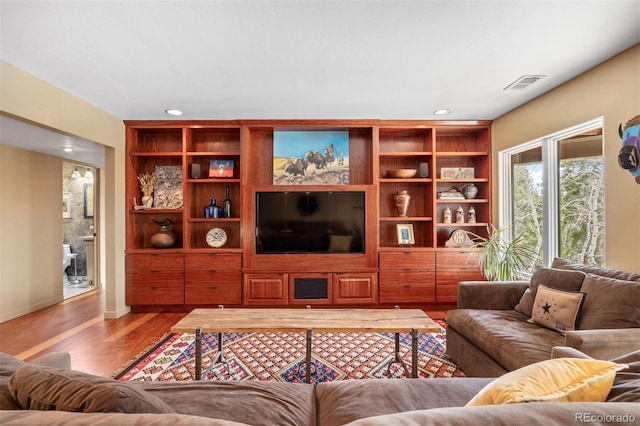 12653 Rancho Ct, Conifer, CO 80433 - living room featuring wood finished floors and recessed lighting