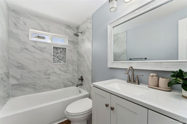 full bath featuring vanity, tub / shower combination, and toilet