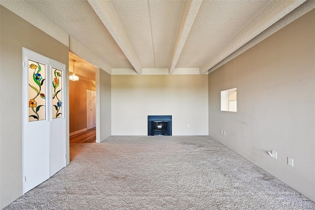7865 E Mississippi Ave Unit 1504, Denver, CO 80247 - unfurnished living room with carpet flooring, a fireplace, and a textured ceiling