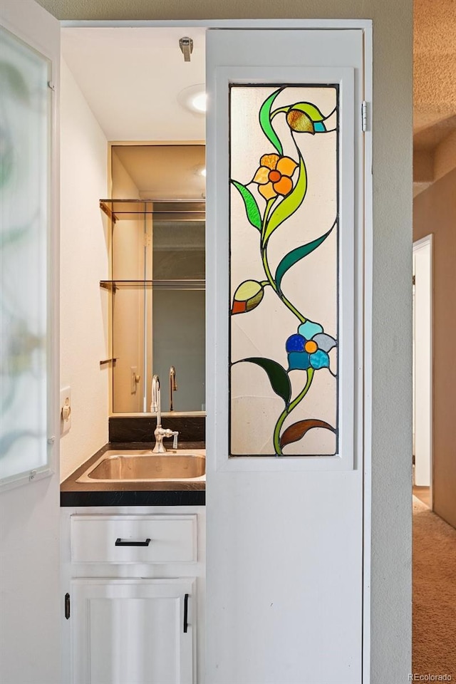 7865 E Mississippi Ave Unit 1504, Denver, CO 80247 - indoor wet bar with carpet floors