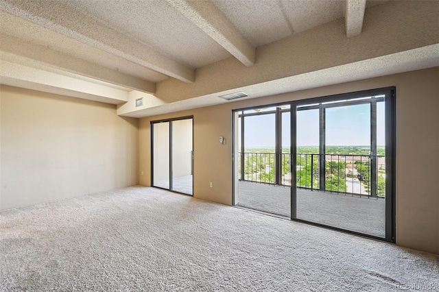 7865 E Mississippi Ave Unit 1504, Denver, CO 80247 - carpeted spare room with beamed ceiling