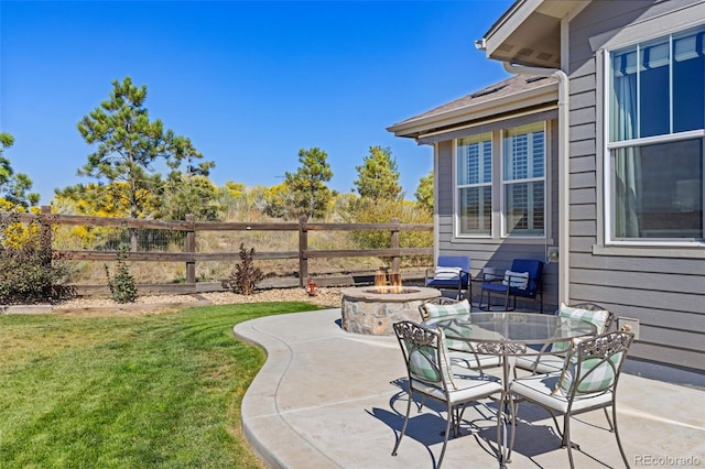 view of patio featuring a fire pit