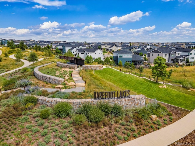 view of home's community featuring a yard