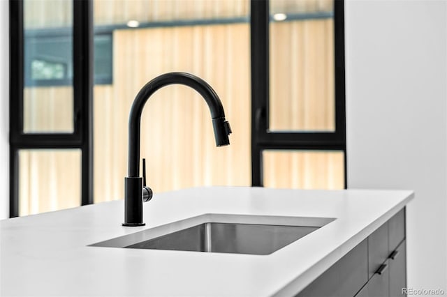1601 Park Ave Unit 307, Denver, CO 80218 - kitchen view of a sink and light countertops