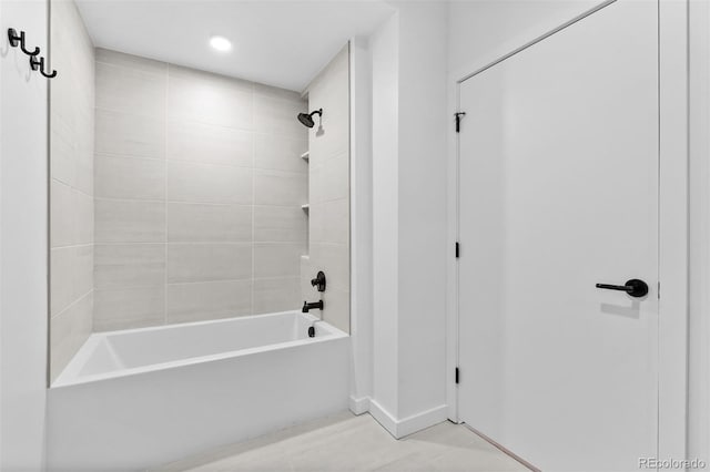 1601 Park Ave Unit 307, Denver, CO 80218 - bathroom featuring bathing tub / shower combination, baseboards, and recessed lighting