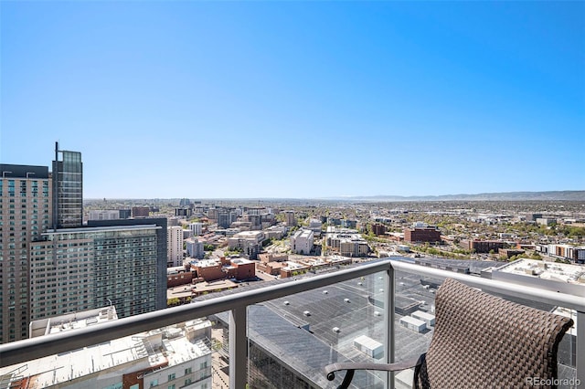 balcony featuring a city view