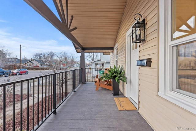 balcony featuring a residential view