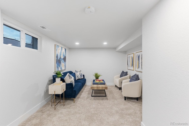 living area featuring recessed lighting, visible vents, baseboards, and carpet flooring