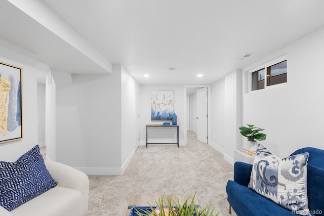 living area with recessed lighting, carpet, and baseboards