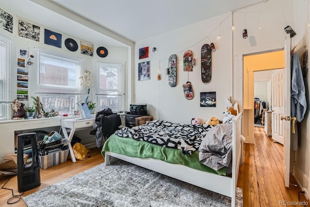 bedroom featuring hardwood / wood-style flooring