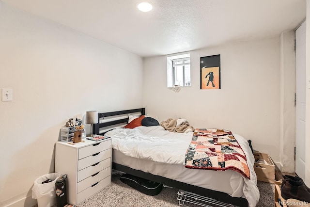 bedroom featuring light carpet