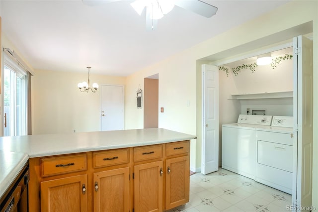 19421 E Milan Cir, Aurora, CO 80013 - washroom with washing machine and clothes dryer, a ceiling fan, light flooring, and a chandelier
