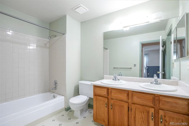 19421 E Milan Cir, Aurora, CO 80013 - bathroom featuring toilet, double vanity, and shower / washtub combination
