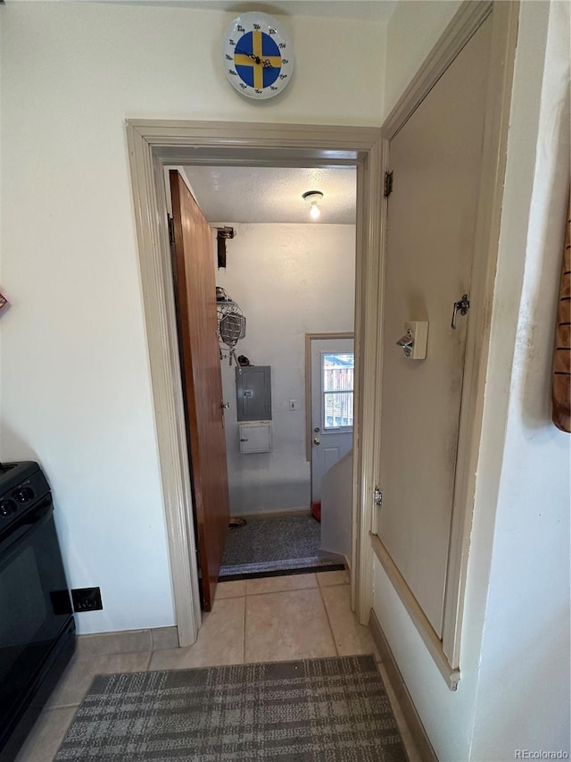 hallway with light tile patterned floors