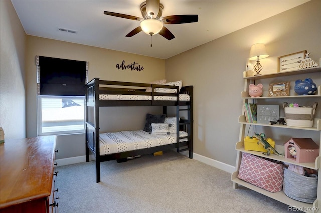 bedroom featuring light carpet, visible vents, baseboards, and ceiling fan