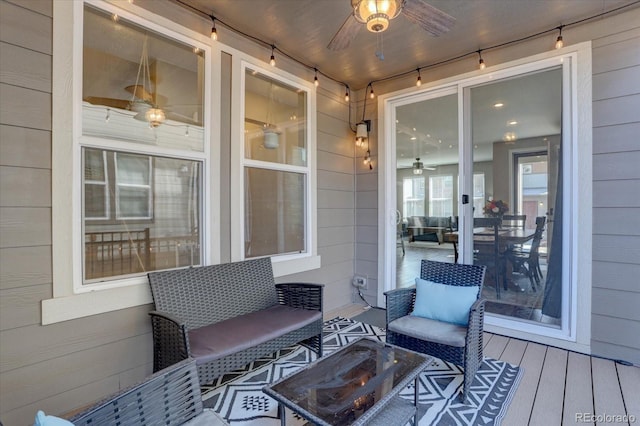 wooden terrace with ceiling fan