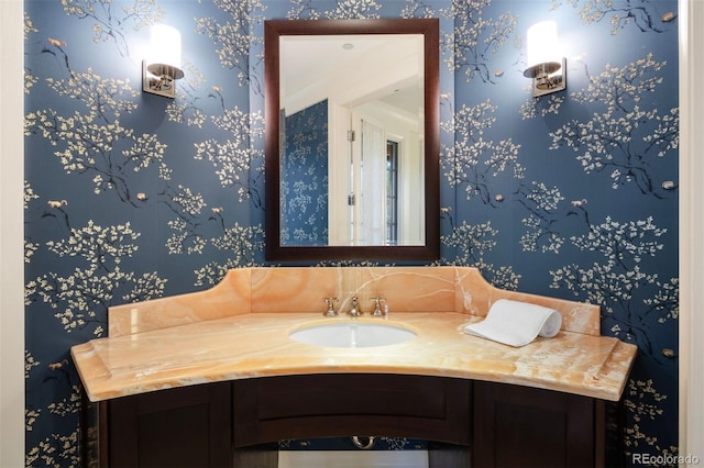 67 Indigo Way, Castle Rock, CO 80108 - bathroom with wallpapered walls and vanity