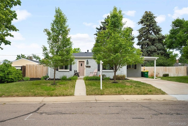 5740 S Cherokee St, Littleton, CO 80120 - obstructed view of property featuring concrete driveway and an attached carport