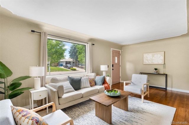 5740 S Cherokee St, Littleton, CO 80120 - living area with wood finished floors and baseboards