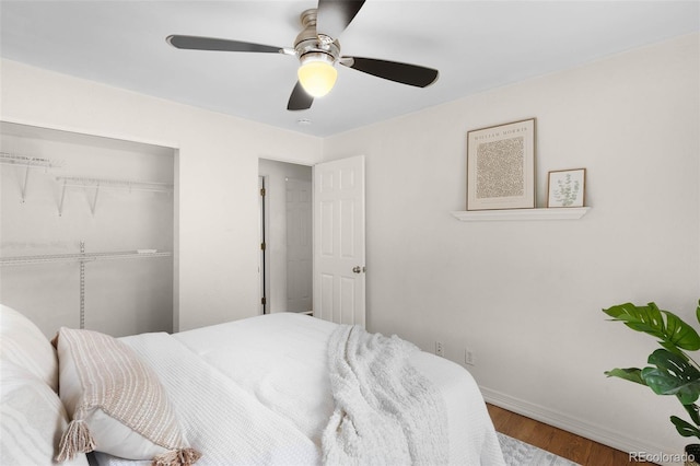 5740 S Cherokee St, Littleton, CO 80120 - bedroom featuring wood finished floors, a closet, and ceiling fan