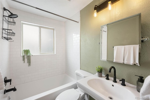 5740 S Cherokee St, Littleton, CO 80120 - full bath featuring a textured wall and bathtub / shower combination