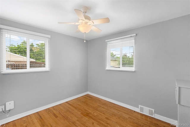 5740 S Cherokee St, Littleton, CO 80120 - empty room with light wood-style floors and a ceiling fan