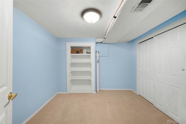5740 S Cherokee St, Littleton, CO 80120 - unfurnished bedroom featuring light carpet and a closet
