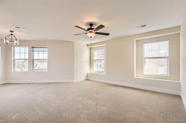 15705 Red Deer Dr, Morrison, CO 80465 - empty room with visible vents, light colored carpet, and baseboards