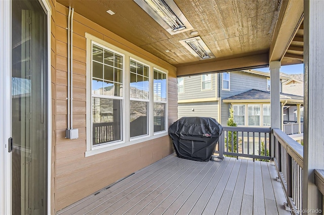 15705 Red Deer Dr, Morrison, CO 80465 - wooden terrace with a grill