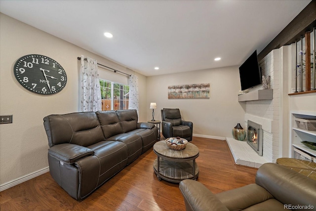 6936 S Knolls Way, Centennial, CO 80122 - living room with baseboards, wood finished floors, a fireplace, and recessed lighting