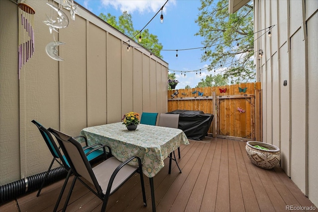 6936 S Knolls Way, Centennial, CO 80122 - wooden terrace with outdoor dining area