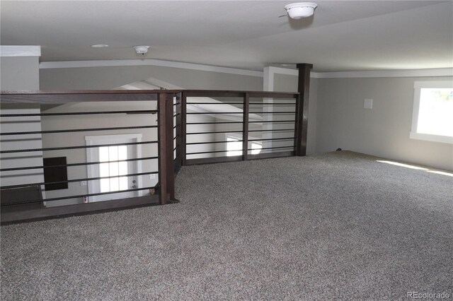 unfurnished living room featuring carpet and lofted ceiling