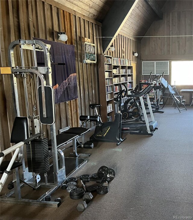 workout area featuring wood walls, carpet floors, high vaulted ceiling, and wood ceiling