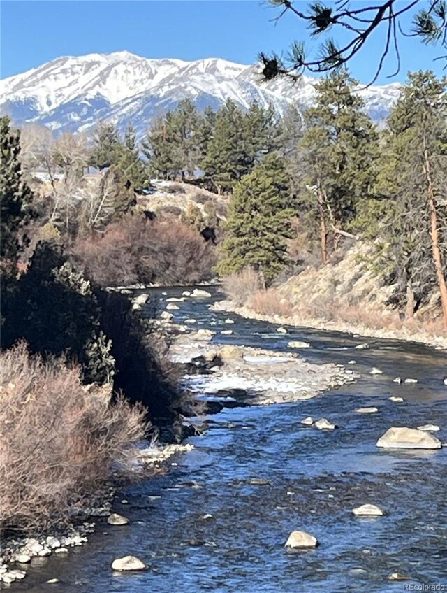 view of mountain feature featuring a water view