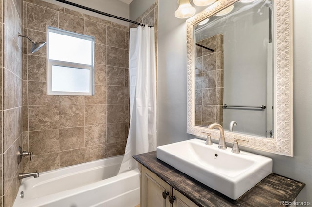 bathroom featuring vanity and shower / bath combo