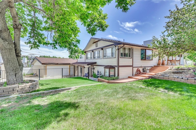 view of front of house with a front lawn