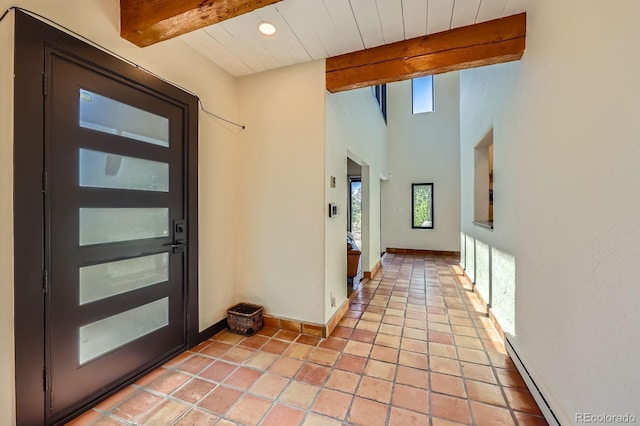 foyer entrance featuring baseboard heating, beam ceiling, recessed lighting, baseboards, and light tile patterned floors