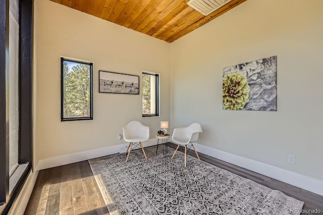 sitting room with wooden ceiling, baseboards, wood finished floors, and lofted ceiling