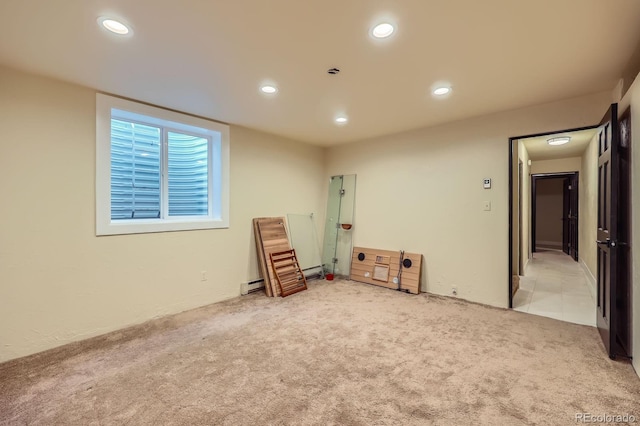 empty room with recessed lighting and carpet