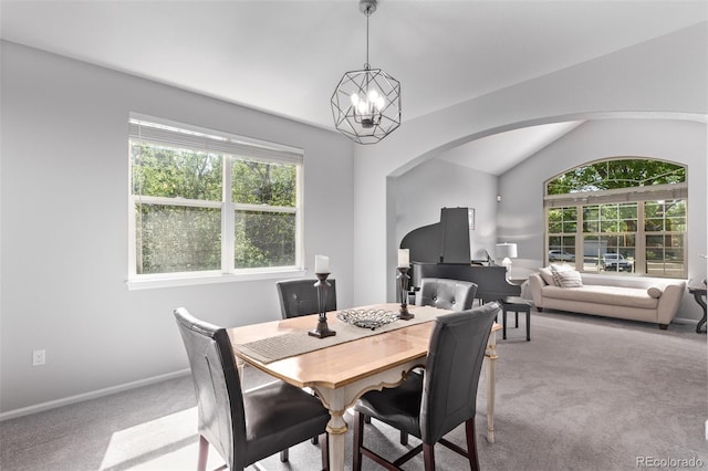 10345 Lions Heart, Lone Tree, CO 80124 - dining area with arched walkways, carpet flooring, plenty of natural light, vaulted ceiling, and a chandelier
