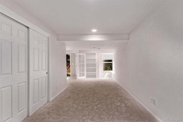 10345 Lions Heart, Lone Tree, CO 80124 - hall featuring carpet floors, built in shelves, and recessed lighting