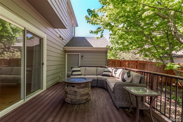 10345 Lions Heart, Lone Tree, CO 80124 - wooden deck featuring an outdoor living space with a fire pit