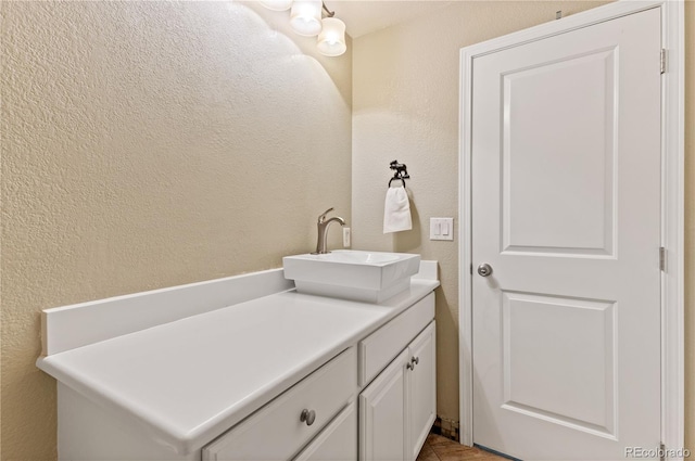 bathroom with vanity and tile patterned flooring