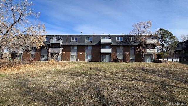100 E Highline Cir Unit 307, Centennial, CO 80122 - view of front facade featuring mansard roof